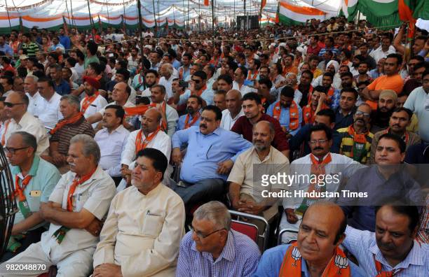 Supporters and workers during a public rally of BJP President Amit Shah to mark "historic martyrdom anniversary" of Jana Sangh founder Syama Prasad...