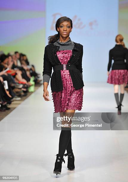Model walks the runway wearing Barbie by David Dixon fall 2010 collection at the Allstream Centre on April 1, 2010 in Toronto, Canada.