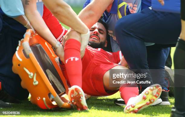 Dylan Bronn of Tunisia leaves the pitch on a stretcher with an injury during the 2018 FIFA World Cup Russia group G match between Belgium and Tunisia...