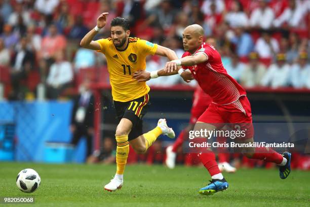 Yannick Carrasco of Belgium in action with Yohan Ben Alouane of Tunisia during the 2018 FIFA World Cup Russia group G match between Belgium and...