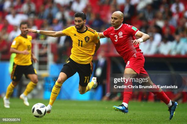 Yannick Carrasco of Belgium in action with Yohan Ben Alouane of Tunisia during the 2018 FIFA World Cup Russia group G match between Belgium and...