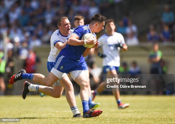 Waterford , Ireland - 23 June 2018; Shane Carey of Monaghan in action against Brian Looby of Waterford during the GAA Football All-Ireland Senior...