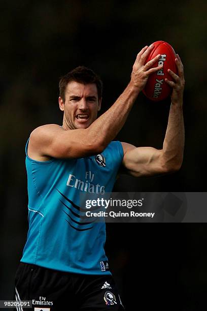 Darren Jolly of the Magpies marks during a Collingwood Magpies training session at Gosch's Paddock on April 2, 2010 in Melbourne, Australia.