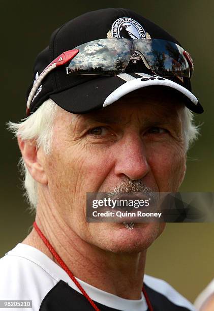 Mick Malthouse the coach of the Magpies looks on during a Collingwood Magpies training session at Gosch's Paddock on April 2, 2010 in Melbourne,...