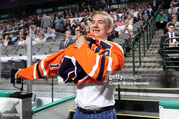 Ryan McLeod reacts after being selected 40th overall by the Edmonton Oilers during the 2018 NHL Draft at American Airlines Center on June 23, 2018 in...