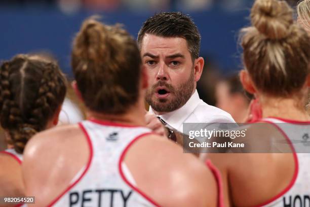 Dan Ryan, head coach of the Thunderbirds addresses his players at a time-out during the round eight Super Netball match between the Fever and the...