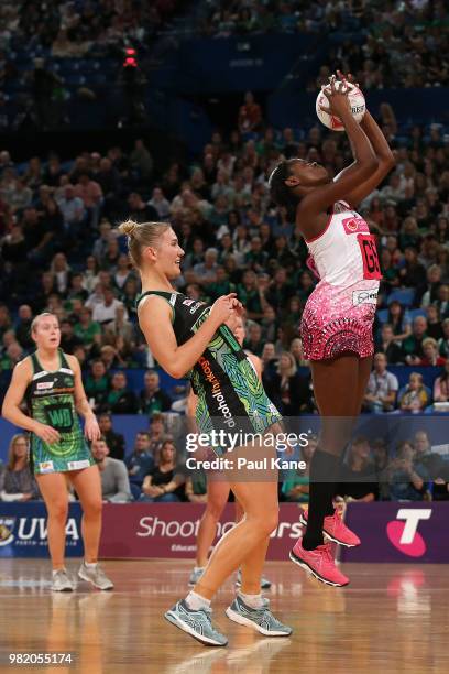 Shimona Nelson of the Thunderbirds catches the ball against Courtney Bruce of the Fever during the round eight Super Netball match between the Fever...