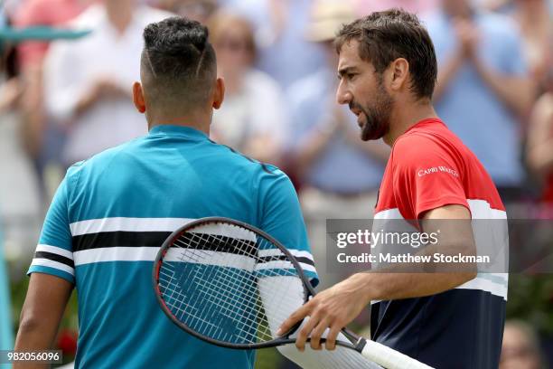 Marin Cilic of Croatia is congratulated after his men's singles semifinal match by Nick Kyrgios of Australia on Day Six of the Fever-Tree...