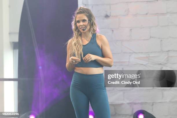 Co-founder Tone It Up Katrina Scott leads yoga on stage at the Studio Tone It Up Live! at Duggal Greenhouse on June 23, 2018 in Brooklyn, New York.