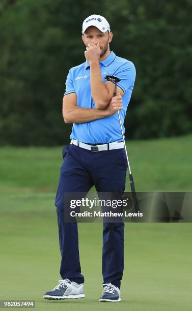 Maximilian Kieffer of Germany looks on after missing a putt on the 14th green during day three of the BMW International Open at Golf Club Gut...