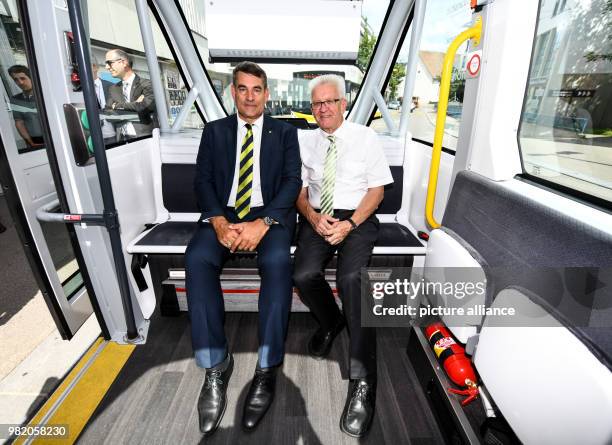 June 2018, Switzerland, Schaffhausen: Christian Amsler , government president of the canton Schaffhausen, and Winfried Kretschmann , Premier of...