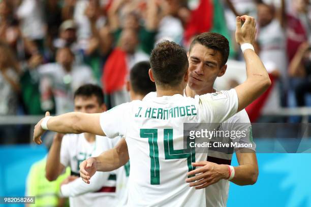 Javier Hernandez of Mexico celebrates with teammate Hector Moreno after scoring his team's second goal during the 2018 FIFA World Cup Russia group F...