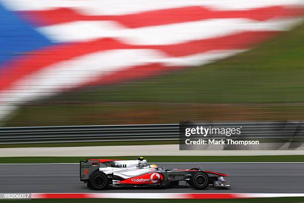 Lewis Hamilton of Great Britain and McLaren Mercedes drives during practice for the Malaysian Formula One Grand Prix at the Sepang Circuit on April...