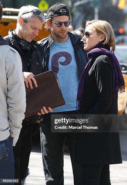 Director Neil Berger, Bradley Cooper and Abbie Cornish film "The Dark Fields" on location on 5th Avenue on April 1, 2010 in New York, New York.