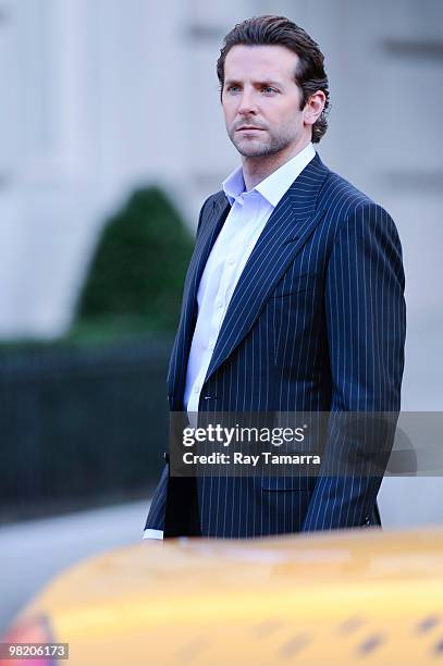 Actor Bradley Cooper films a scene at the "Dark Fields" movie set in the Upper East Side on April 01, 2010 in New York City.