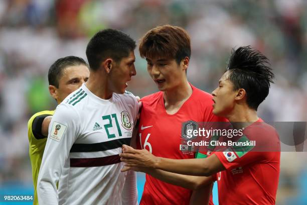 Edson Alvarez of Mexico argues wth Ki Sung-Yueng and Lee Seung-Woo of Korea Republic during the 2018 FIFA World Cup Russia group F match between...