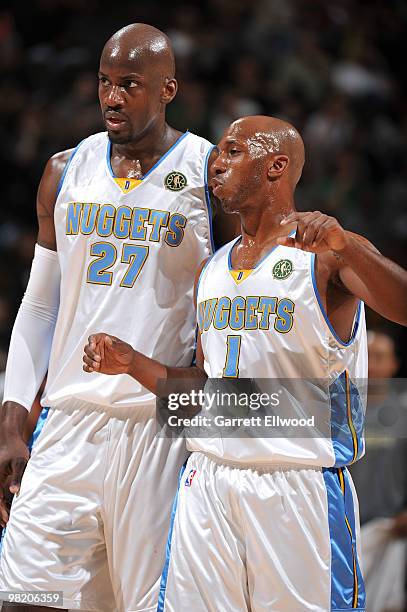 Johan Petro and Chauncey Billups of the Denver Nuggets talk during a time out against the Portland Trail Blazers on April 1, 2010 at the Pepsi Center...