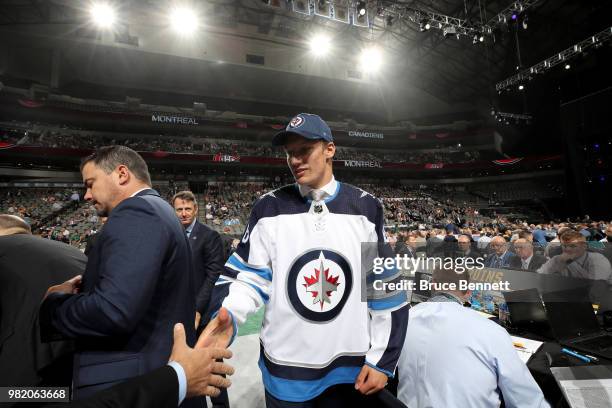 David Gustafsson reacts after being selected 60th overall by the Winnipeg Jets during the 2018 NHL Draft at American Airlines Center on June 23, 2018...