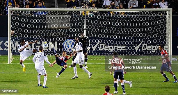 Marcelo Saragosa of Chivas USA attempts to kick a bicycle kick against Los Angeles Galaxy during the first half of the MLS soccer match on April 1,...