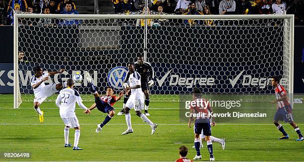 Marcelo Saragosa of Chivas USA attempts to kick a bicycle kick against Los Angeles Galaxy during the first half of the MLS soccer match on April 1,...