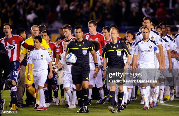 Los Angeles Galaxy and of Chivas USA soccer teams enter the Home Depot Center for their MLS soccer match on April 1, 2010 in Carson, California.