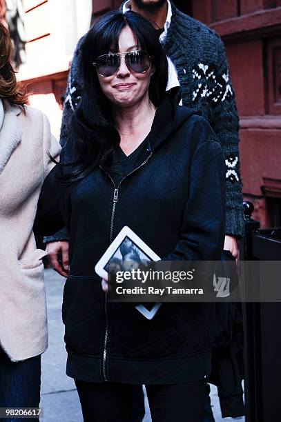 Television personality Shannen Doherty walks in Midtown Manhattan on April 01, 2010 in New York City.