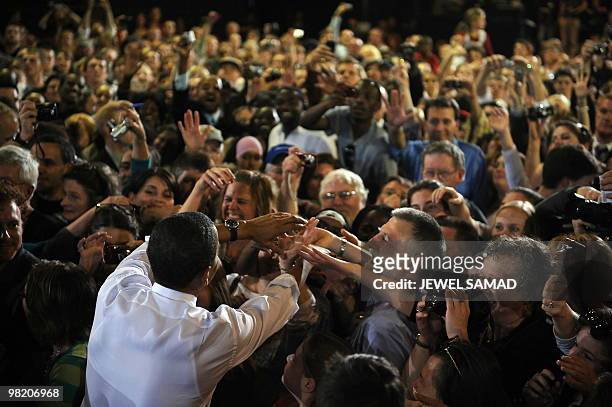 President Barack Obama greets supporters after speaking on health insurance reform at the Portland Expo Center in Portland, Maine, on April 1, 2010....