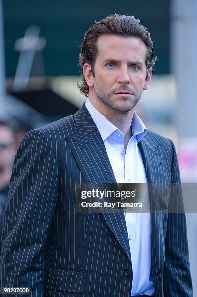 Actor Bradley Cooper films a scene at the "Dark Fields" movie set in the Upper East Side on April 01, 2010 in New York City.