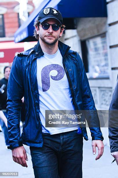 Actor Bradley Cooper walks to his trailer at the "Dark Fields" movie set in the Upper East Side on April 01, 2010 in New York City.