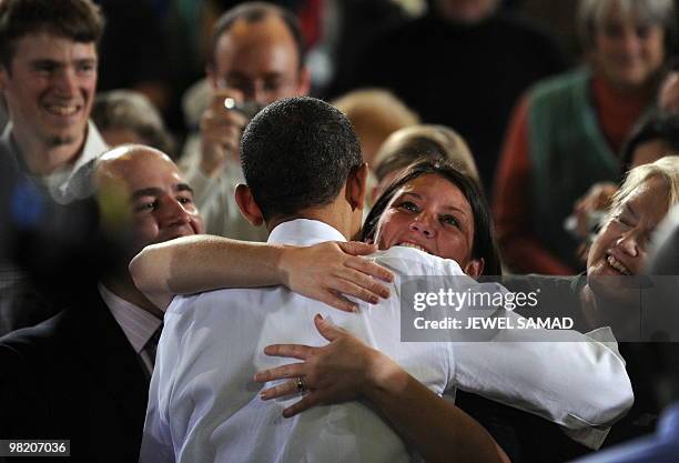 President Barack Obama greets a supporter after speaking on health insurance reform at the Portland Expo Center in Portland, Maine, on April 1, 2010....