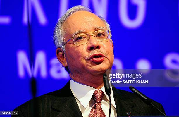 To go with AFP story "Malaysia-Politics-Njib-One year" by Beh Lih Yi Malaysia's Prime Minister Najib Razak speaks at an investment conference in...