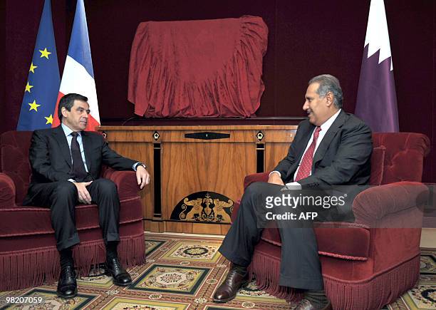 Qatari Prime Minister and Foreign Minister Sheikh Hamad bin Jassem bin Jabr Al-Thani and his French counterpart Francois Fillon meet prior to the...