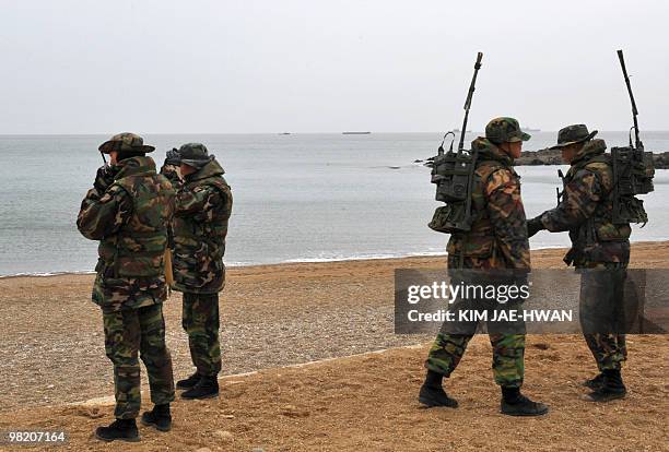 South Korean marines search for possible survivors and bodies from the sunken South Korean warship, patrol combat corvette PCC-772 Cheonan, at...