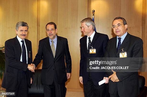 Foreign policy chief Javier Solana meets with former Italian Prime Minister Massimo D'Alema , former Norwegian Prime Minister Thorbjorn Jagland and...