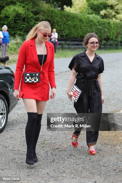 Sophie Turner and Maisie Williams arriving at Rayne Church in Kirkton on Rayne for the wedding of Kit Harrington and Rose Leslie on June 23, 2018 in...