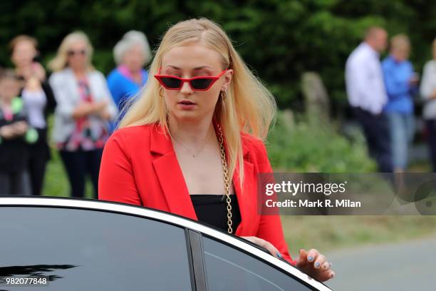 Sophie Turner arriving at Rayne Church in Kirkton on Rayne for the wedding of Kit Harrington and Rose Leslie on June 23, 2018 in Aberdeen, Scotland.