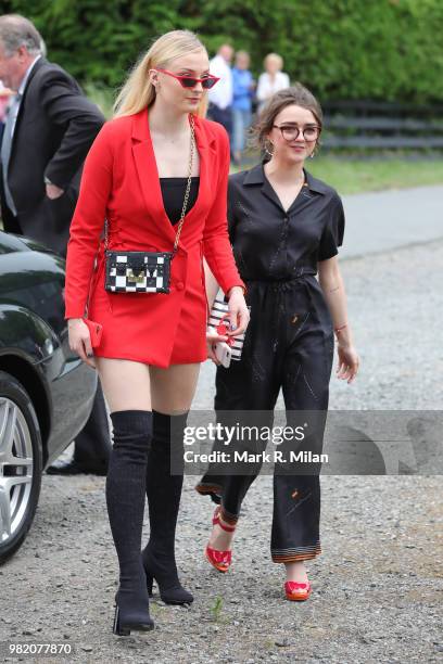 Sophie Turner and Maisie Williams arriving at Rayne Church in Kirkton on Rayne for the wedding of Kit Harrington and Rose Leslie on June 23, 2018 in...