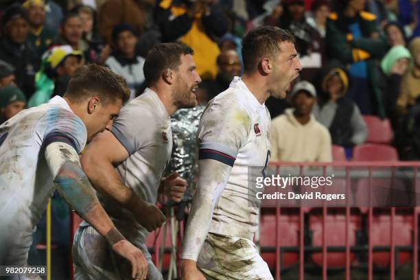 Jonny May of England celebrates after scoring a try during the third test match between South Africa and England at Newlands Stadium on June 23, 2018...