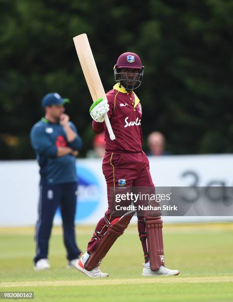 Jason Mohammed of West Indies raises his bat after scoring 50 runs during the Tri-Series International match between England Lions and West Indies A...