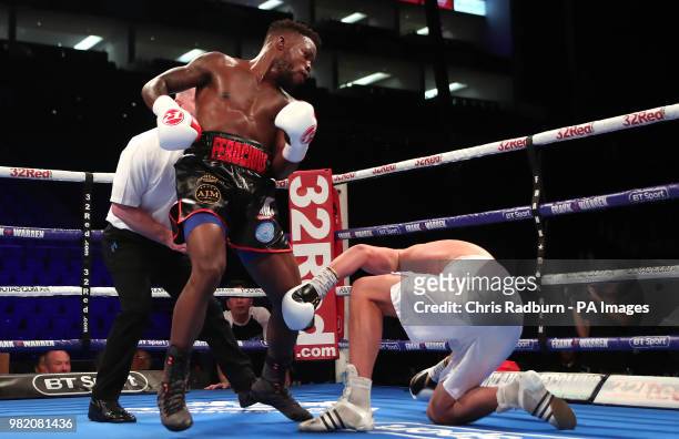 Darryl Williams knocks down Raimond Sniedze in the International Super-Middleweight Contest at The O2, London.