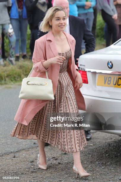 Emilia Clarke arriving at Rayne Church in Kirkton on Rayne for the wedding of Kit Harrington and Rose Leslie on June 23, 2018 in Aberdeen, Scotland.