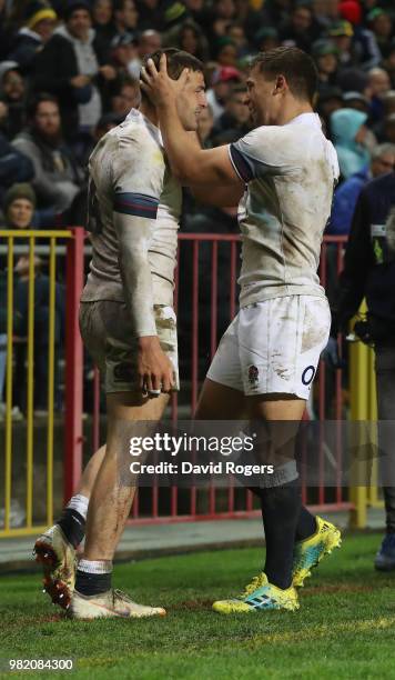 Jonny May of England celebrates with team mate Ben Youngs after scoring a try during the third test match between South Africa and England at...