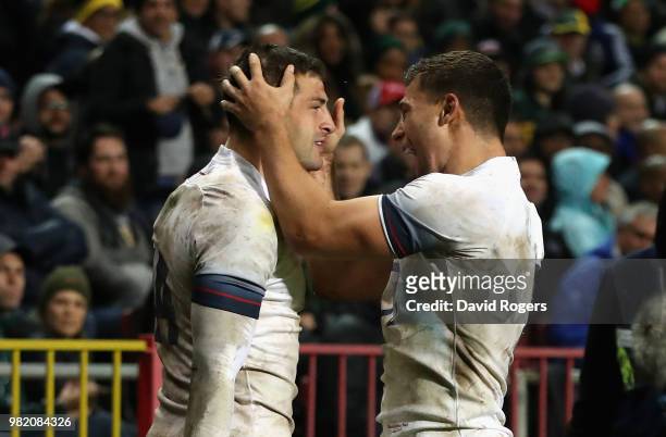Jonny May of England celebrates with team mate Ben Youngs after scoring a try during the third test match between South Africa and England at...