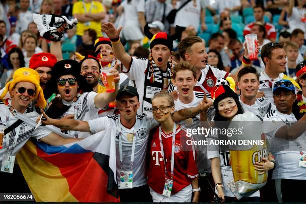 Germany supporters cheer prior to the Russia 2018 World Cup Group F football match between Germany and Sweden at the Fisht Stadium in Sochi on June...