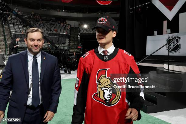 Jonathan Gruden reacts after being selected 95th overall by the Ottawa Senators during the 2018 NHL Draft at American Airlines Center on June 23,...