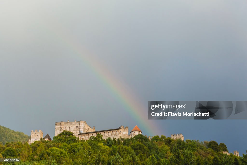 Pergine Castle with rainbow