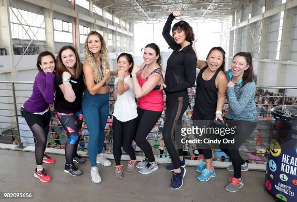 Co-founders, Tone It Up Katrina Scott and Karena Dawn pose with guests at the Studio Tone It Up Live! at Duggal Greenhouse on June 23, 2018 in...