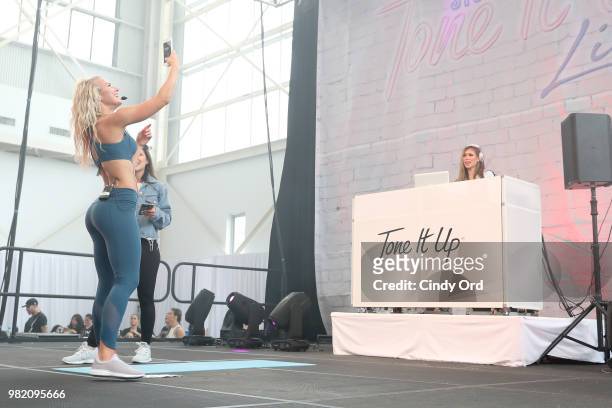 Chyna Rae leads yoga on stage at the Studio Tone It Up Live! at Duggal Greenhouse on June 23, 2018 in Brooklyn, New York.