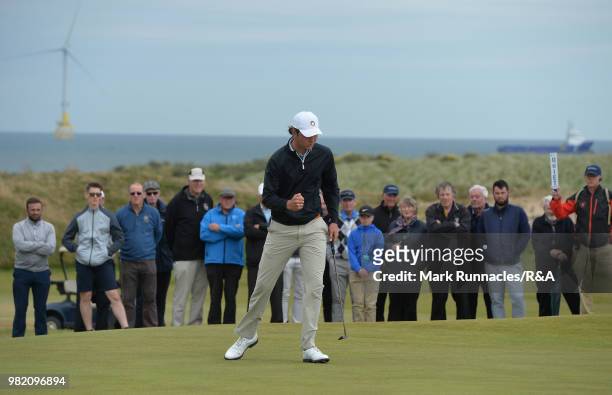 Jovan Rebula of Republic of South Africa reacts after sinking a putt at the 11th green in his match with Robin Dawson of Tramore in the Final of The...