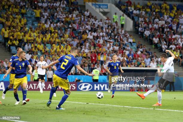 Julian Draxler shoots part Mikael Lustig of Sweden during the 2018 FIFA World Cup Russia group F match between Germany and Sweden at Fisht Stadium on...